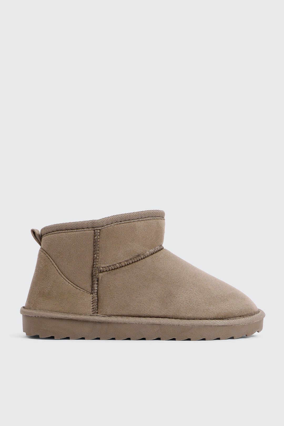 Bottes mini en faux mouton