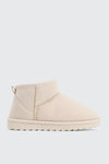 Bottes mini en faux mouton