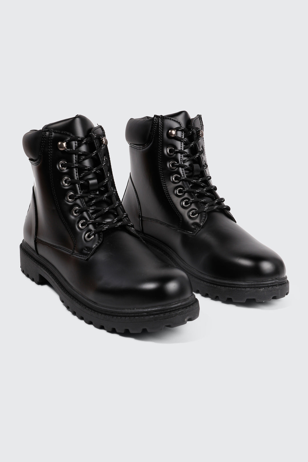 Bottes lacées à semelle crantée