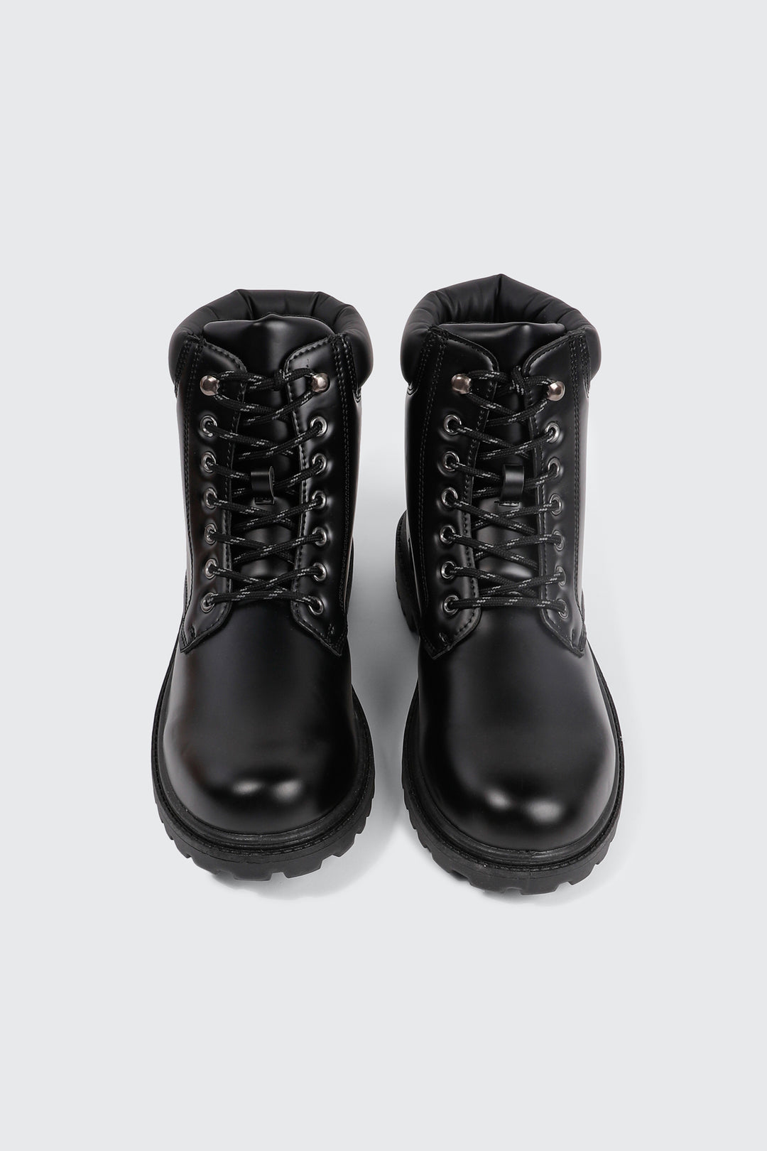 Bottes lacées à semelle crantée