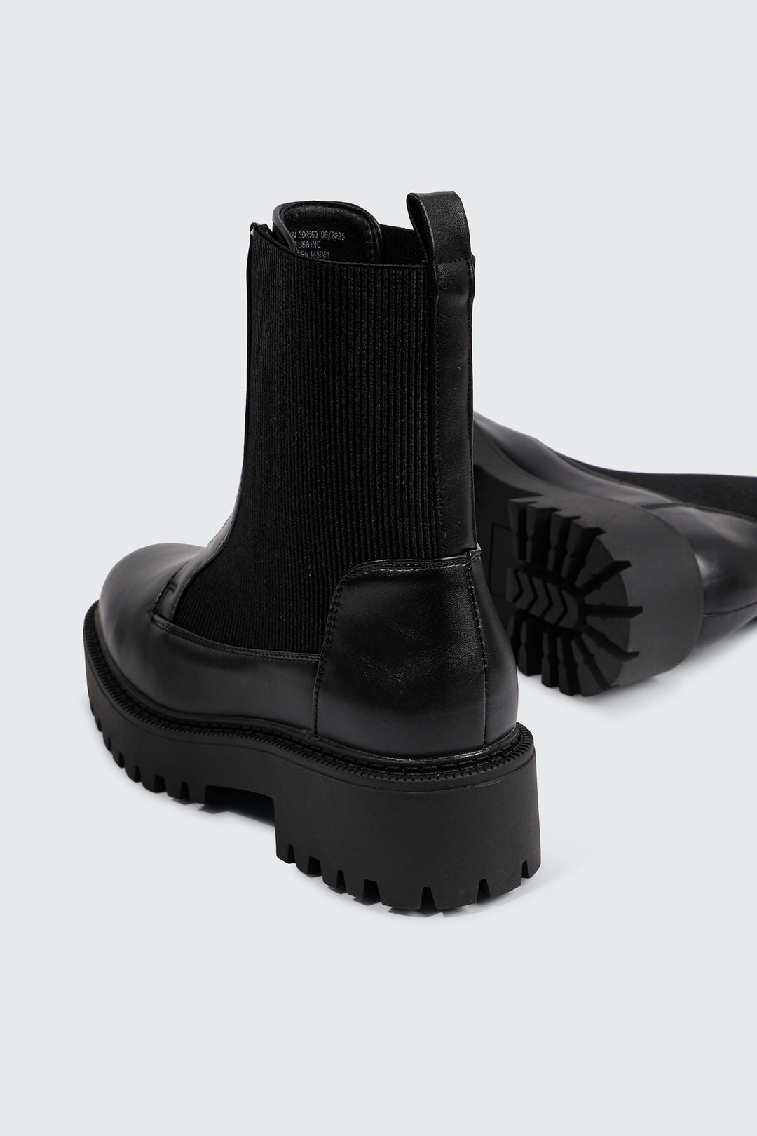 Lug Sole Front Zip Boots