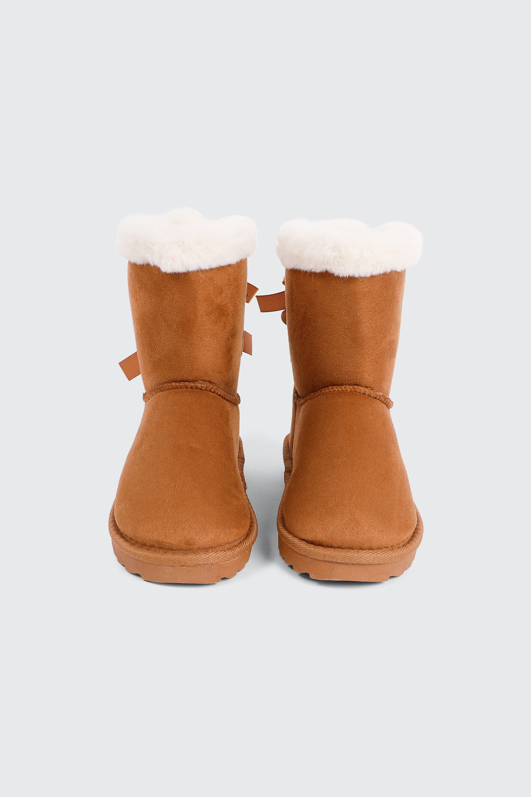 Faux Sheepskin Boots with Bow Details