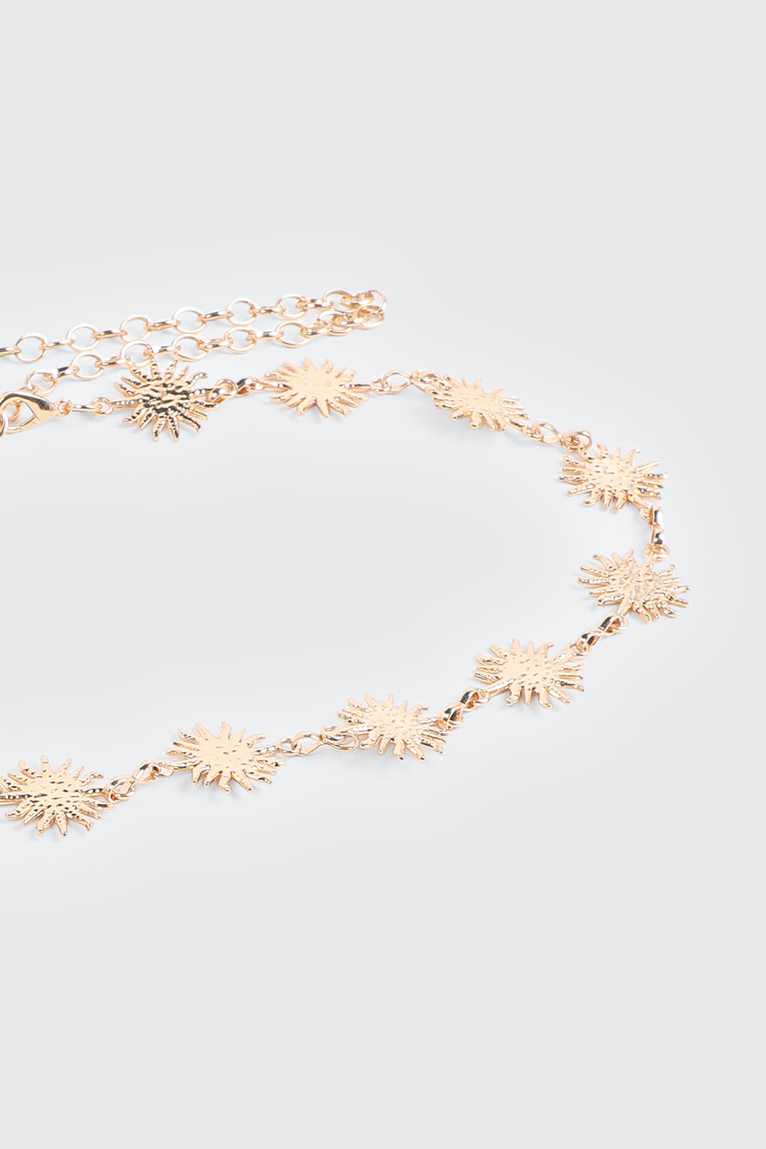 Ceinture à maillons et soleils