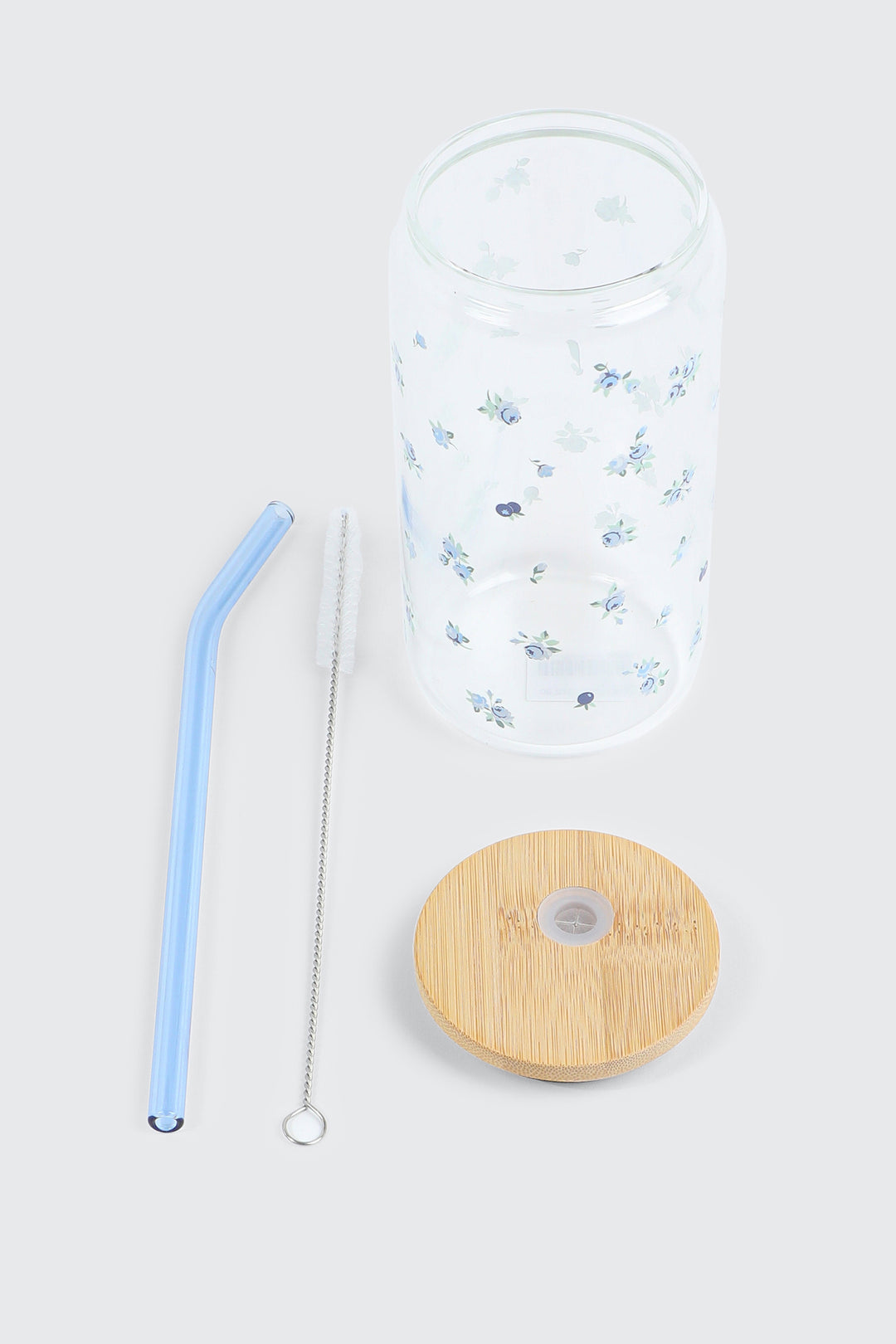 Bouteille en verre à motif de bleuets