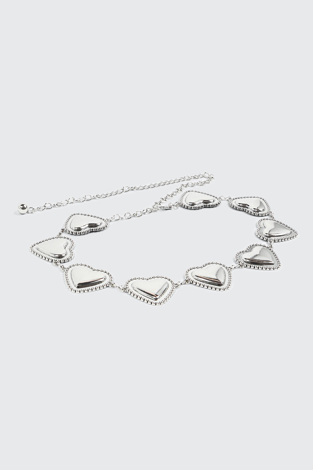 Ceinture chaîne à cœur cloutée