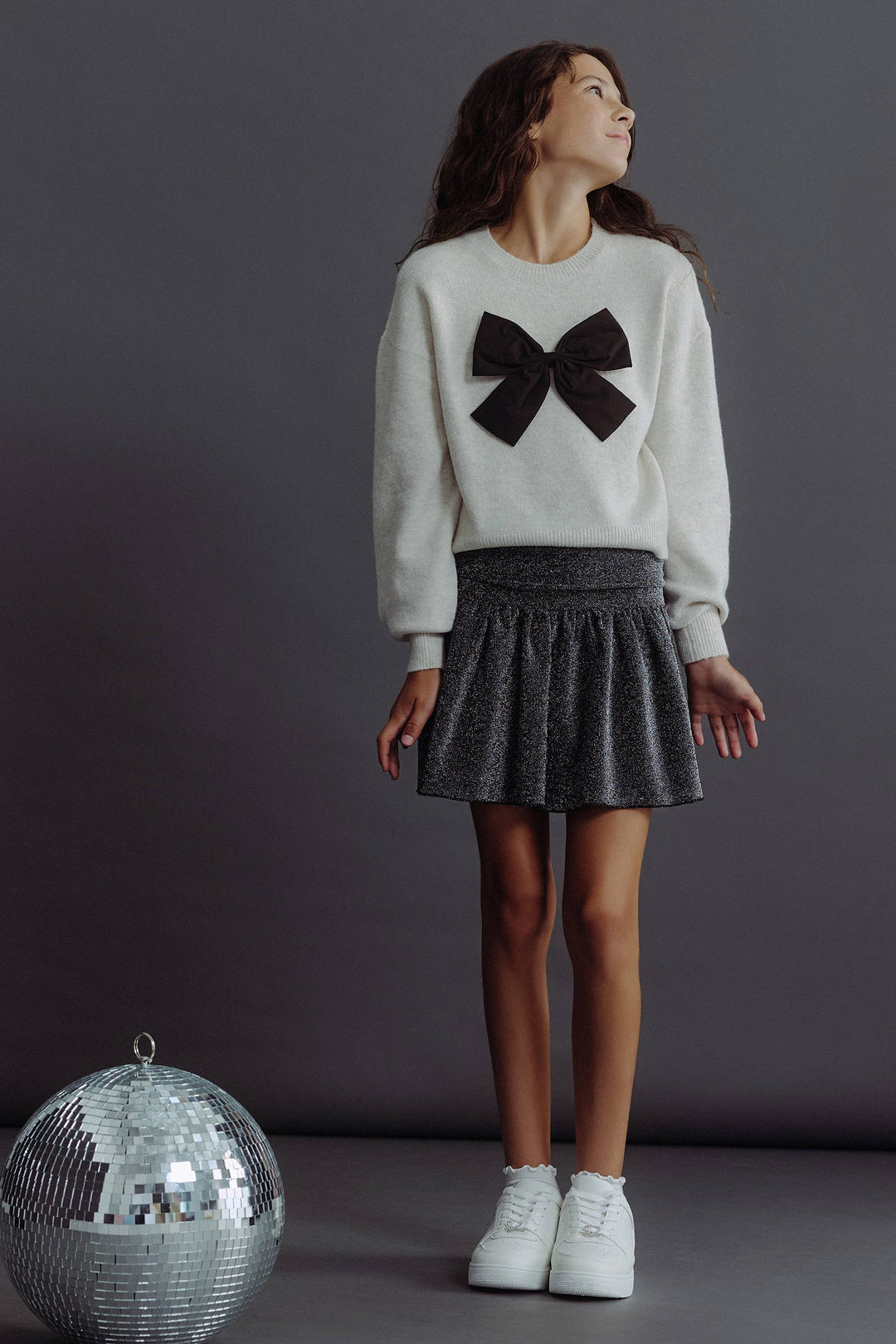 Jupe courte scintillante à taille froncée