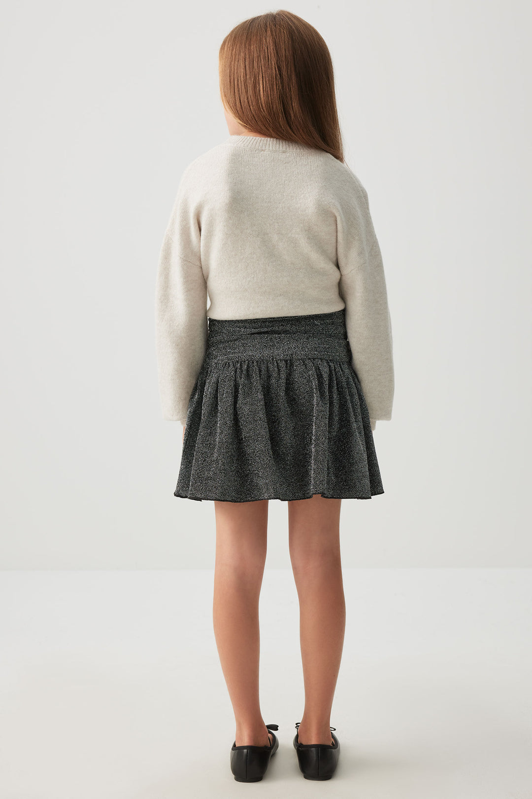 Jupe courte scintillante à taille froncée