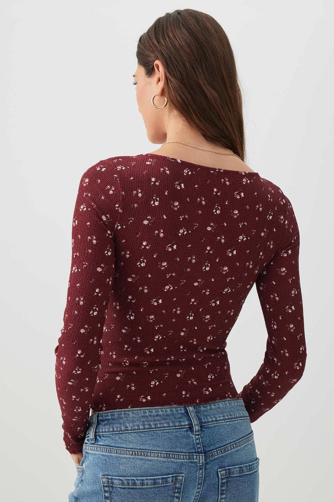 T-shirt à col V et manches longues fleuri