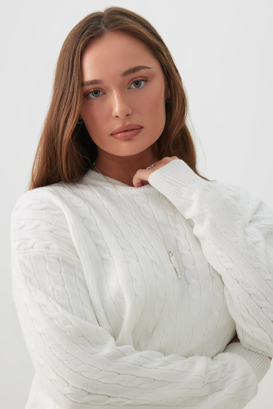 Chandail long à col col en tricot torsadé