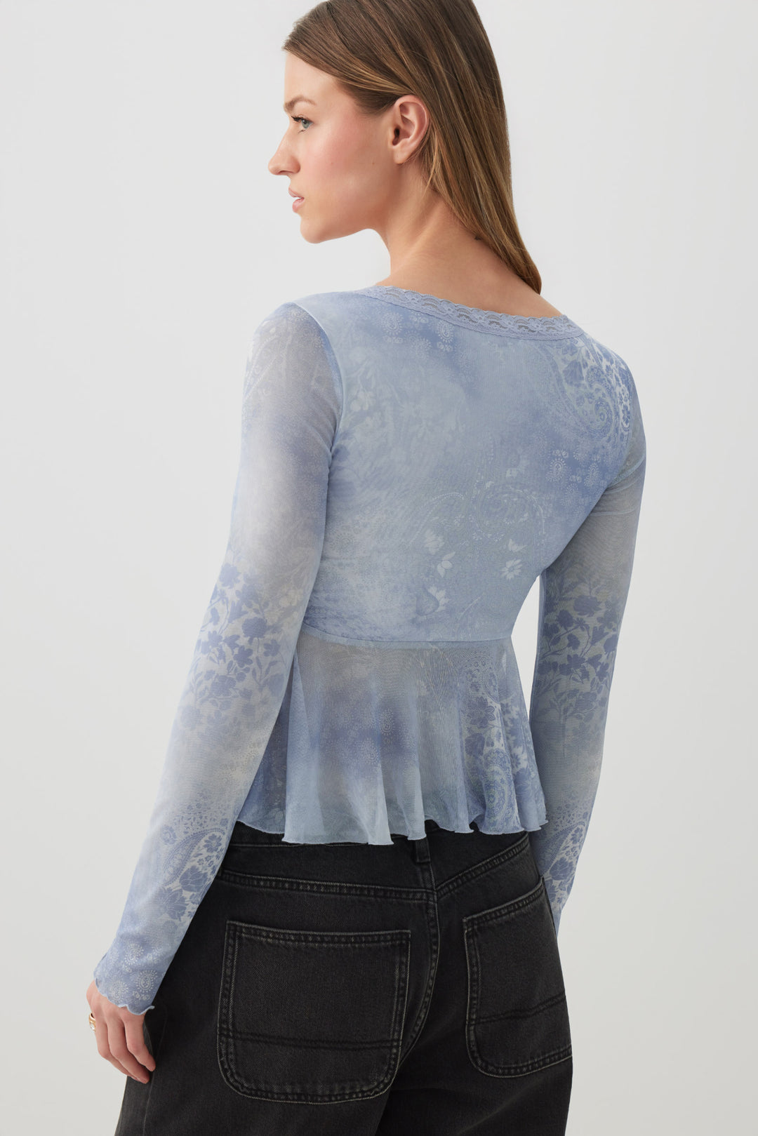 Blouse col V en maille filet imprimée