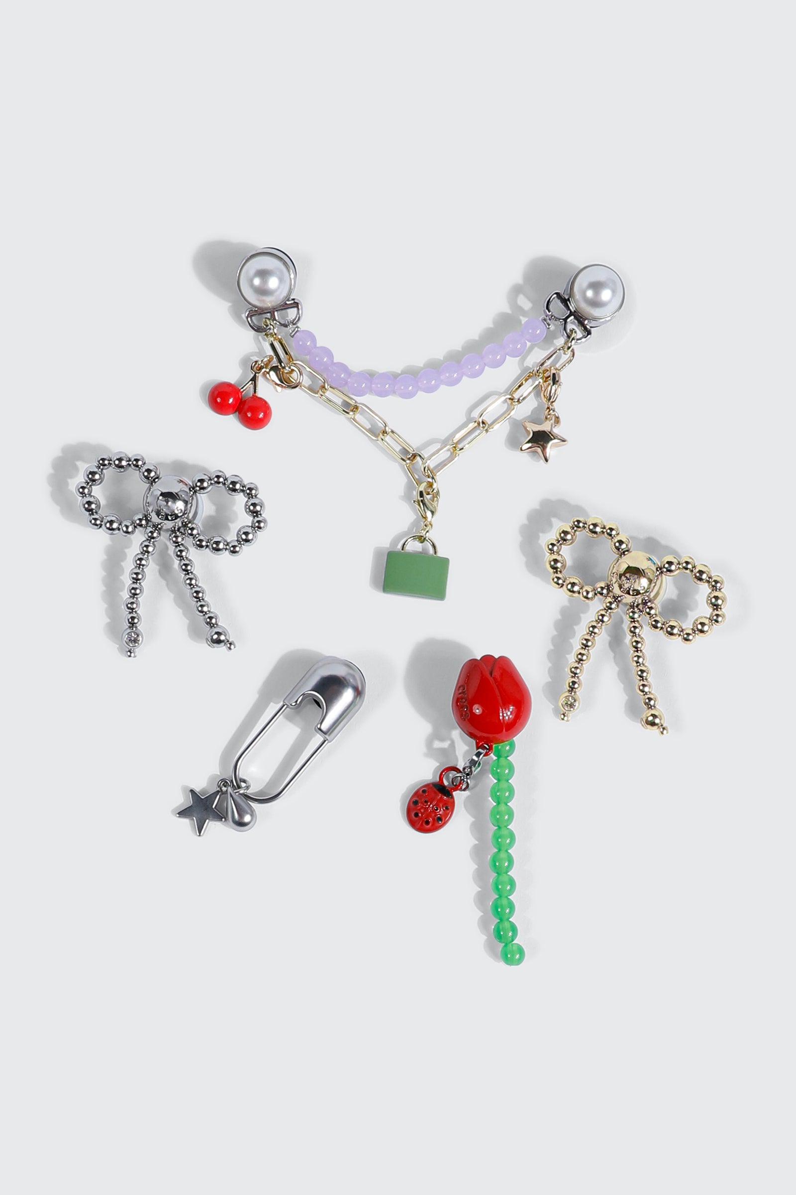 キャビエット 5-Pack Meta Icon Jibbitz™ Charms – Ardene