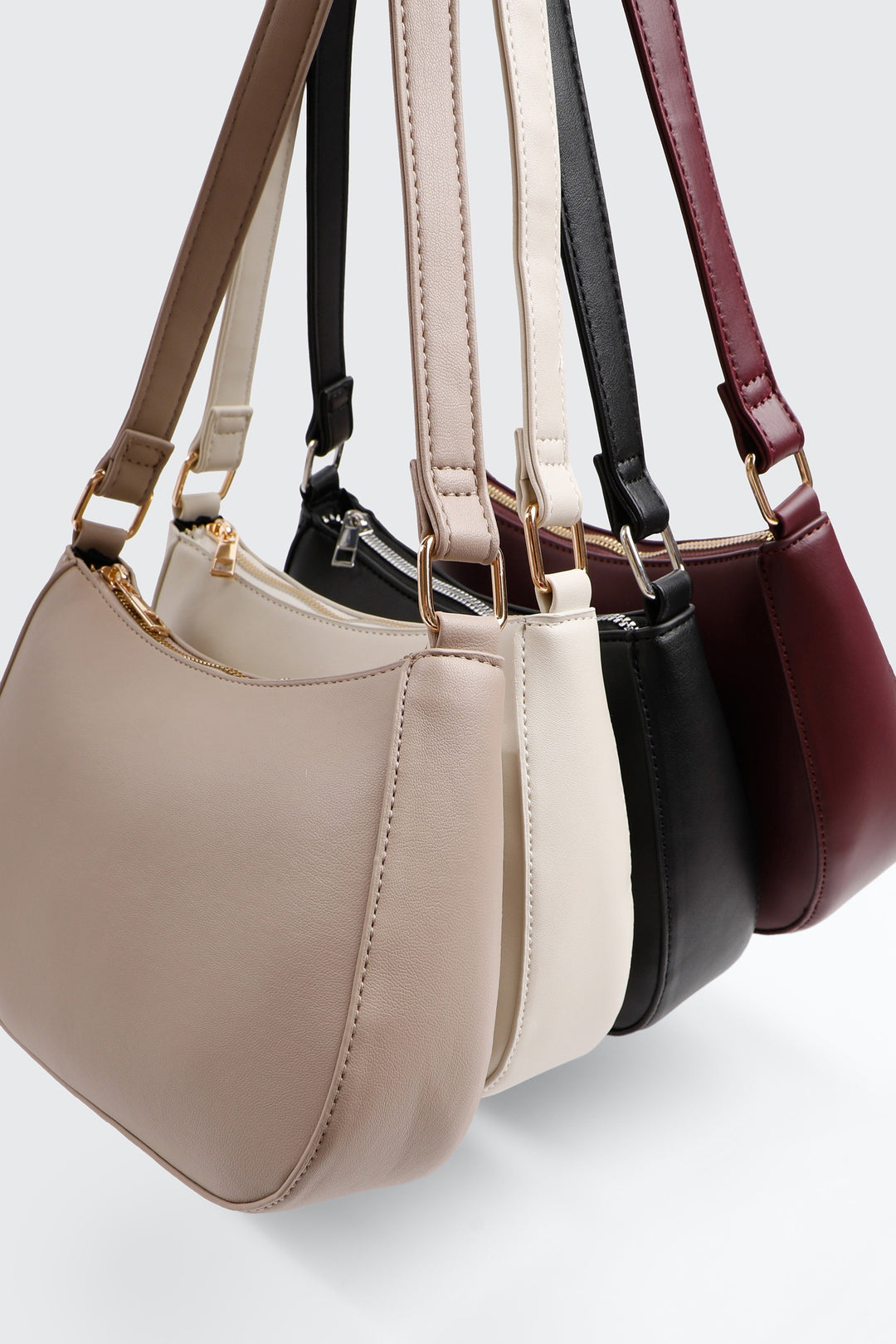 Sac d'épaule arrondi en faux cuir