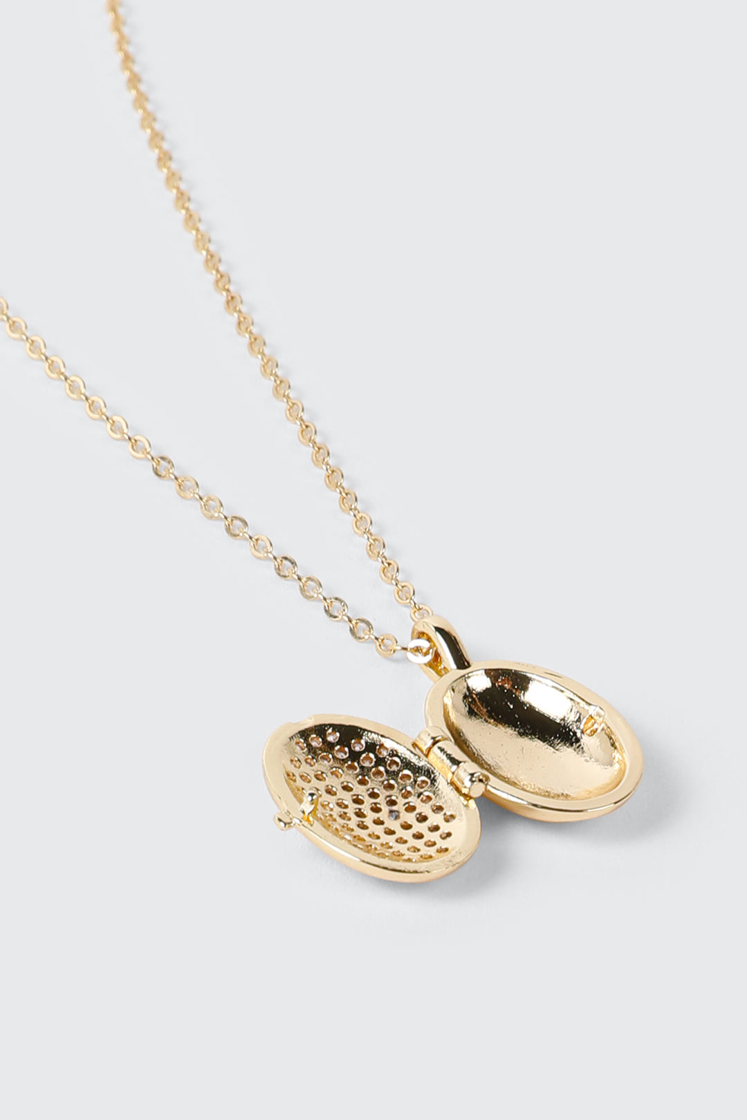 Collier médaillon plaqué or 14 carats