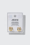 Boucles d’oreilles à trois rangs avec pierres