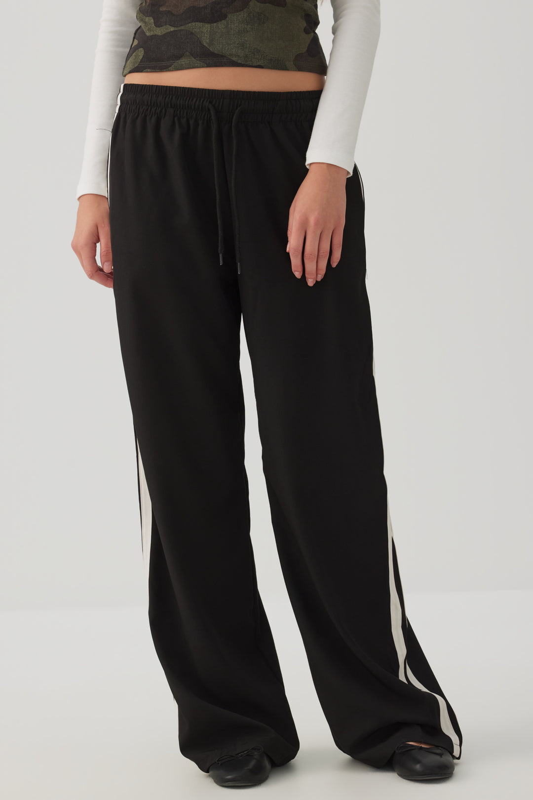 Pantalon de survêtement à bandes latérales