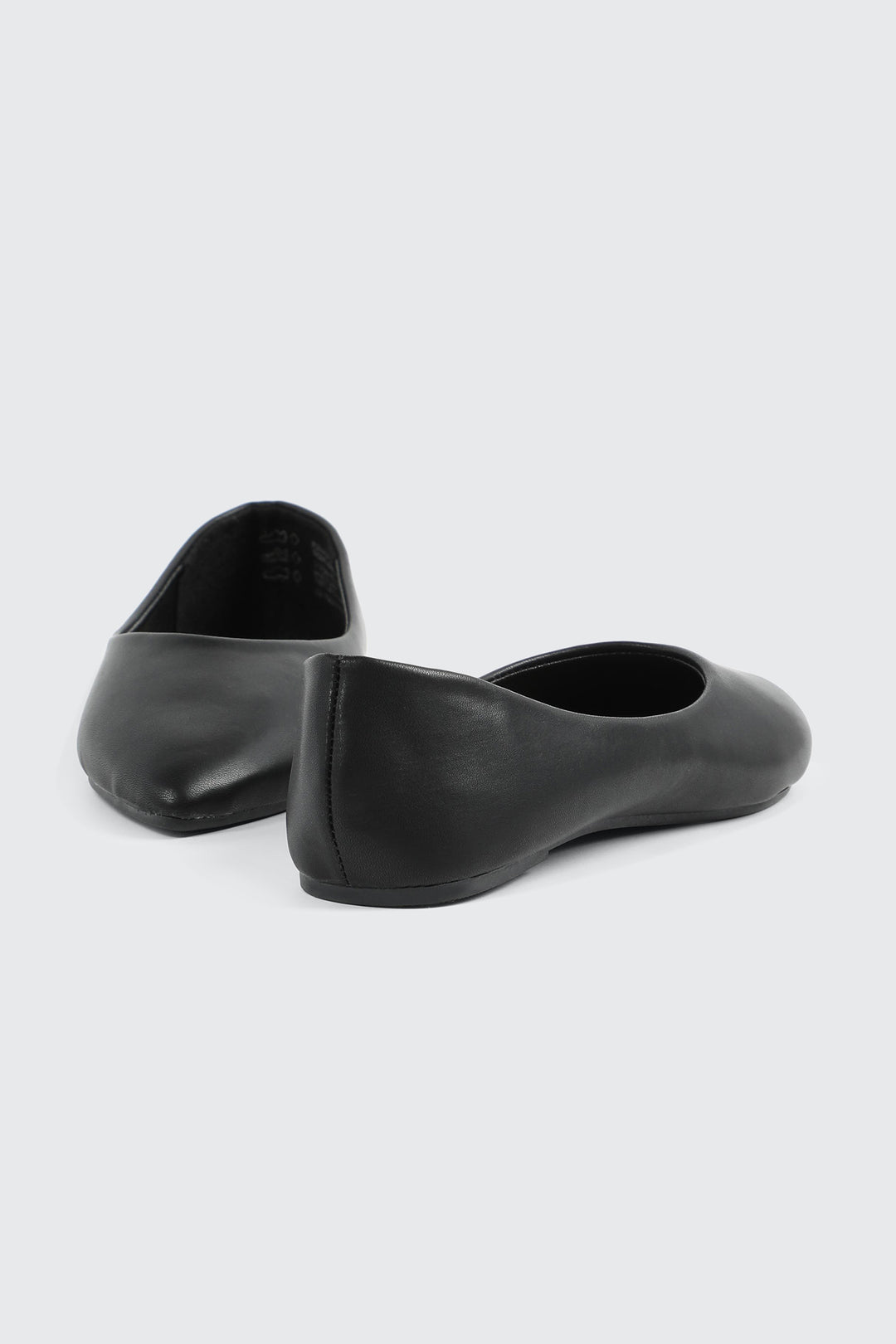 Talon plats à bout pointu en faux cuir