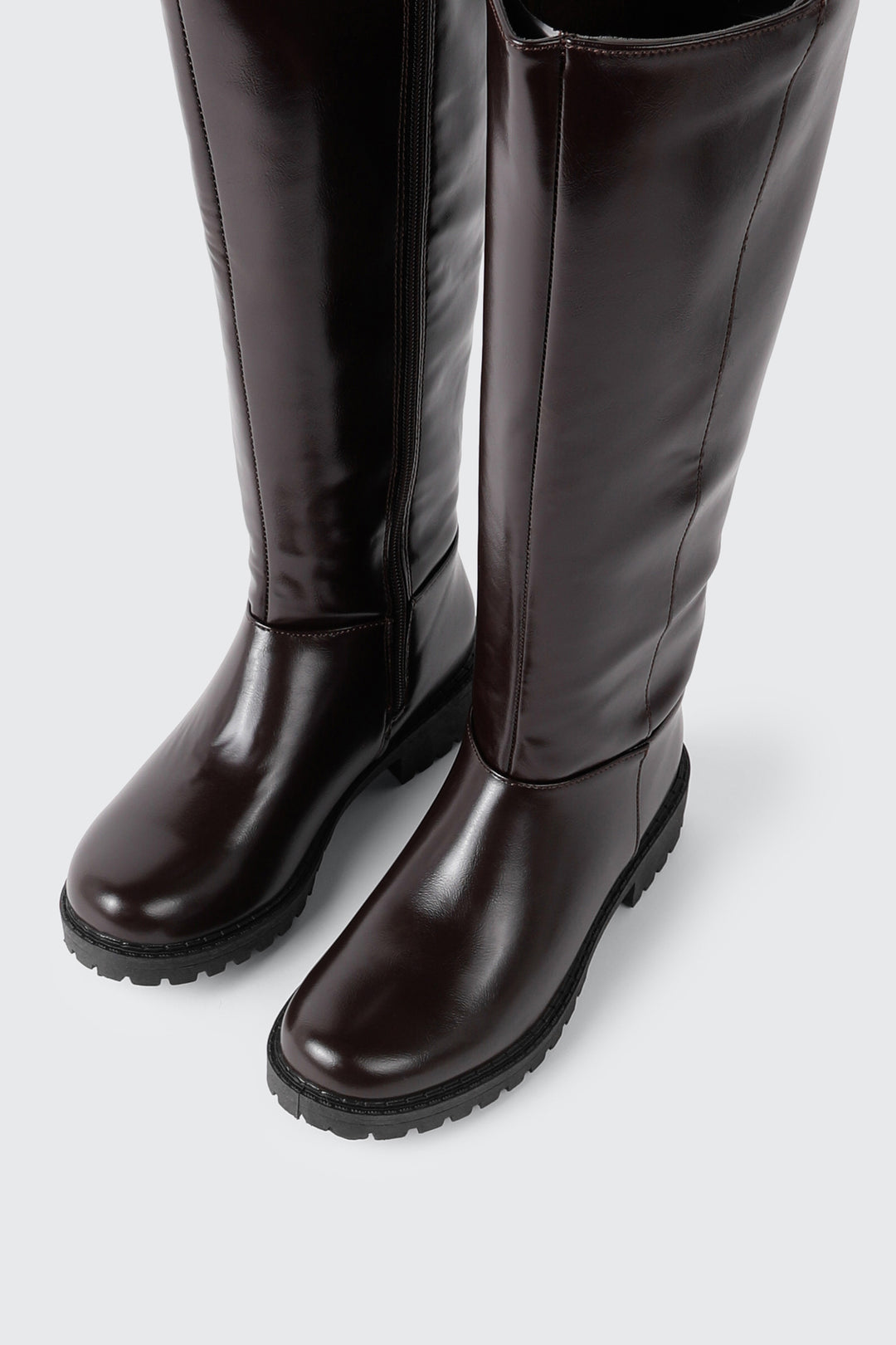 Bottes hautes à semelle crantée
